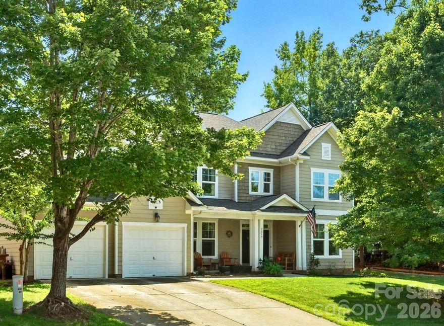 Welcome to this beautifully appointed 4-bedroom home with a huge bonus room in the sought-after Lawson community! **NEW wood flooring on the main level – November 2025!**  The primary suite is conveniently located on the main level and features a renovated spa-like bath with a clawfoot tub, frameless glass shower with gorgeous tile, and a massive walk-in closet. The spacious kitchen boasts granite countertops, tile backsplash and flooring, a huge island, and a butler’s pantry - perfect for entertaining. The open floor plan highlights soaring ceilings in the foyer and great room, while the dedicated office with sliding glass doors provides the ideal work-from-home setup. Upstairs, you’ll find newer LVP flooring, a renovated bathroom with dual access from the bedroom or bonus, plus a walk-in attic for easy storage. Additional features include dual staircases, a roof replaced in July 2024, and an oversized 2-car garage.
Outdoor living shines here with a rocking chair front porch, spacious patio, and a custom paver firepit with knee-wall, ideal for gatherings. All of this in Lawson - a community known for its resort-style amenities, including a clubhouse, fitness center, pools, tennis courts, playgrounds, walking trails, and more.