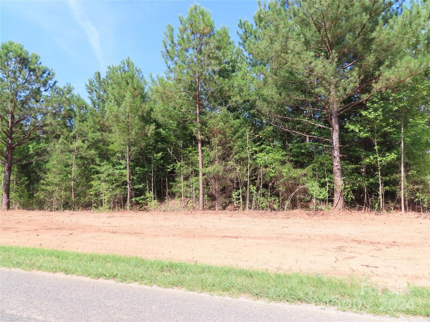 Looking for land with an easy commute to Charlotte? Come and see this 6 acre lot. Located close to Hwy 49 for a easy commute to Lake Wylie, Charlotte, Rock Hill, York & Clover. This 6 acre tract is all usable land. Come and look! Located beside 1230 Chambers Road, York SC 29745. The land is zoned Agriculture which allows for houses. The new owner should be able to put 5 acres in farm use which would allow for a low tax bill. The other acre would be taxed with a house on it once a house is built. 
The land will be deed restricted for houses only, no businesses, 1800 square foot heated minimum, no mobiles or modulars.