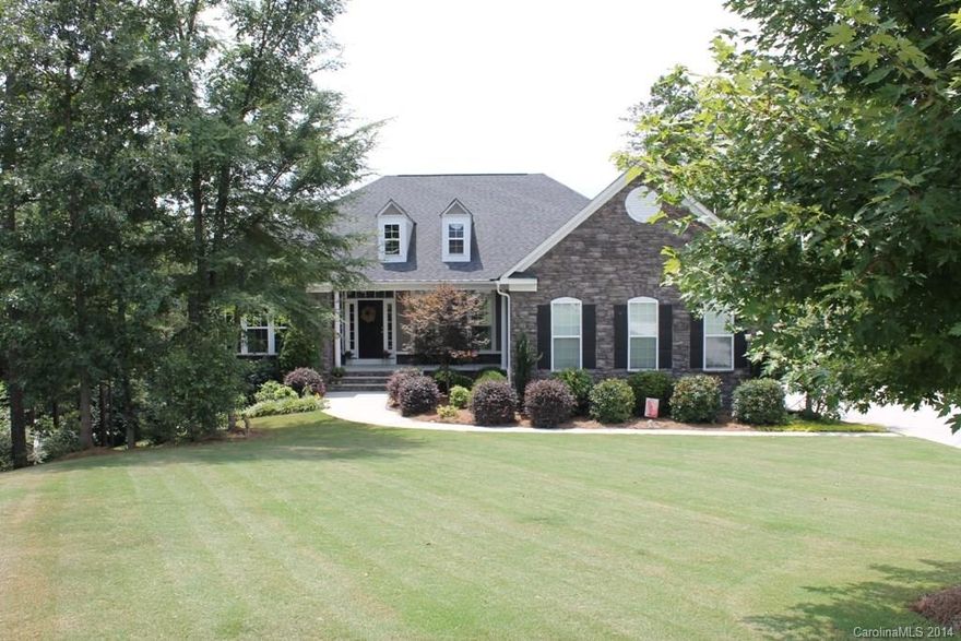 Exquisite Home on Lake Wylie, conveniently located off Hwy160 in Serenity Point w over 6000sf. Feature include Chef’s Kitchen, vaulted ceilings, Study w Custom Cabinets, Sunroom, large deck overlooking h20. Full walk out basement w 2 BRs/2 BAs. ANOTHER Kitchen w granite counters & bar. 2 lg Game rms & tons of storage. This level also has 1 car garage & workshop. Outside an equally impressive backyard leading to 2 lg concrete patios, 1 right on the lake. Private BEACH, boat dock w lift & floater.