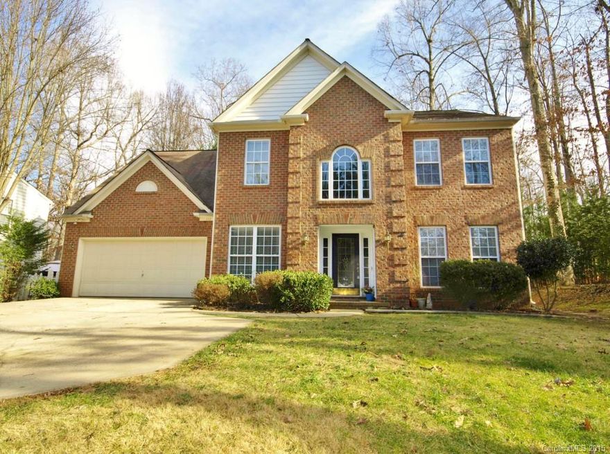 Private Wooded lot convenient to everything in Mooresville from this 5BD/2.5 Bath home by Lake Norman! Large Master BR w/walk-in closet. Partially fenced-in back yrd w/workshop/playhouse that has electric & A/C. Formal Dining & Living Rm ~ LRG family Rm w/FP! Bonus Room upstairs! New Granite CC in Kitchen just installed 2/4/15! Kitchen has SS appliance INCL Refrig. Center Island, Tile Floor, New Lighting. Just Painted inside. Lake Access, Boat Storage, walk to pool, tennis courts & dock fishing.