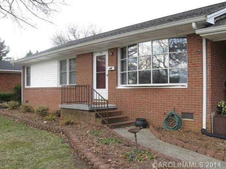 Full brick home with an inground pool.  Nice fireplace in living room with gas logs.  Move in condition located in city, accessible to churchs, groceries, and shopping.  Very nice level yard with mature trees.  Great price for this home.