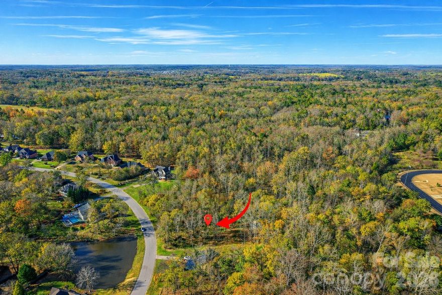 2ND CHANCE OPPORTUNITY | BUILDABLE LOT

The home directly next door sold for high price in Dec 2025, demonstrating the strong resale potential for new construction in this established Rock Hill neighborhood. 

This 0.53-acre residential lot offers paved road frontage with city water and sewer available, making it an excellent opportunity for a custom home or spec build in a neighborhood where nearby homes sold at high price in the last 12 months. 

The lot is not located in a FEMA flood zone and remains buildable under current zoning (RDI). The previous buyer was a builder who chose not to proceed due to project-specific site design preferences related to drainage considerations. The neighboring home directly beside the lot sits within the same local drainage designation.