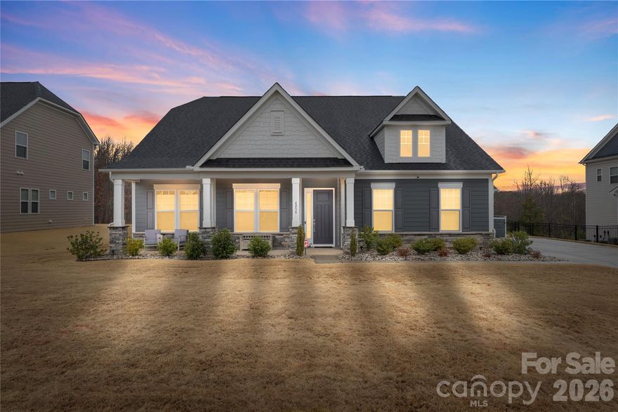 Stunning, like-new 1.5 Story home in the sought after Estates at Covington neighborhood. This 5 Bedroom, 3 bathroom home has an amazing and flexible floor plan that provides countless ways to utilize the space and rooms. The Primary on Main Suite offers a shiplap accent wall in the bedroom, luxurious ensuite bath with dual vanity, subway tile surround shower and a massive walk in closet with custom built in shelving. The main living areas boast durable vinyl plank flooring and neutral paint that allows the natural light to fill the open floor plan of the home providing a cozy and warm living environment. The living room is completed with ample and large windows, a gas fireplace with stone surround and easy access to the kitchen, breakfast area and family room which offers a great flex space or office space if needed! The chef's kitchen offers Quartz counters, a plethora of cabinets, matching SS appliances, a pantry and an oversized eat-at kitchen island! The secondary bedrooms on the main level are all generously sized and again provide so much usability and flexibility to fit any needs! Moving to the upper level, you will love the Guest suite complete with it's own walk in closet and ensuite bathroom, perfect for a split living arrangement or housing guests. The upstairs is completed with another Bed/Bonus room that is perfect for media, play area or a personal gym space! The joy of this home does not stop on the inside, exiting the rear of the home you will love the covered patio with retractable screen making it perfect for any season and beyond that the patio extends into the rear fenced in yard! Great location in the growing Indian Land area with shopping, restaurants and entertaintment near by! Easy access to I77 and I485