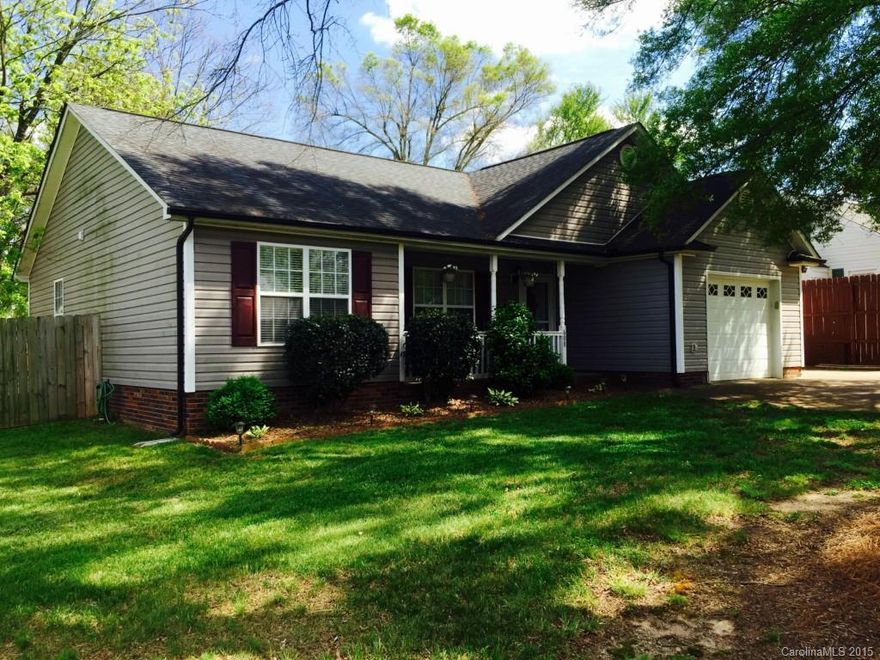 This immaculate home is ready for you to move in! Huge/private fenced in back yard with plenty of room for entertaining on the back deck and paver patio. Separately fenced area for your pet and a wired storage building as well. The living room and kitchen features vaulted ceilings. This home will not last long so schedule your showing today!