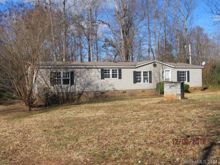 Doublewide mobile home in Forestview School District. Split BR Plan,  3 Bedrooms, 2 Baths, Living Rm, Dining Rm plus Den with Fireplace.  Large Kitchen with Center Isle. Large lot...approx. 1 Acre.
There is an easement on the property to allow access to  land locked properties.