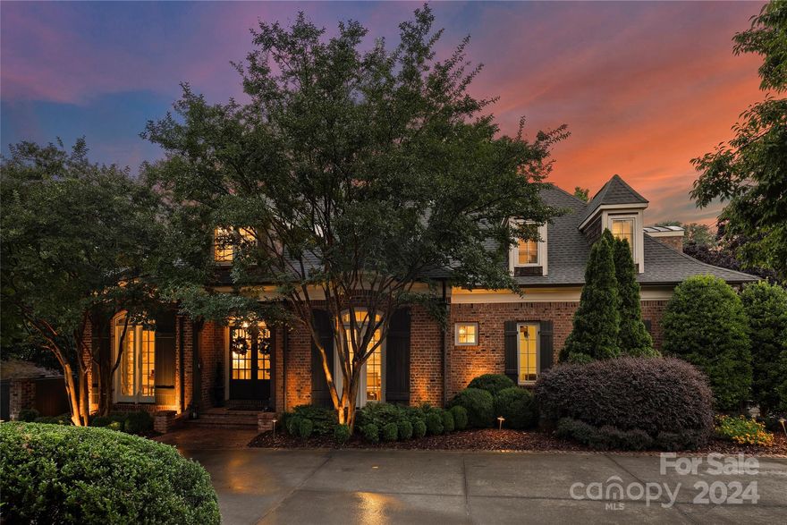 Charming & beautiful full brick home in private enclave of three architecturally inspired homes. This 4 bed/3.5 bath residence features sun-filled open floor plan with 10’ ceilings & beautiful moldings. Stunning entry foyer w/center chandelier & wood beams. Dining rm & living rm/office w/arched openings & windows. Great rm w/fireplace, wonderful natural light & windows! French doors open to gorgeous outdoor gardens & backyard oasis w/paver patio, stone fireplace & custom 2,000 gal in-ground bluestone water feature - serene & private! Gourmet kit w/ceiling beam detail, double wall oven, gas cooktop, island w/pendant lighting & walk-in pantry. Breakfast rm w/designer wallpaper. Dropzone & laundry w/built-in cabs, sink, countertop space & exterior door. Large primary & bath w/walk-in closet, double vanity, garden tub & tile surround shower. 3 spacious bedrms & bonus rm w/2 shared full baths! Excellent location mins from Southpark, restaurants, shopping, hospitals + Uptown.