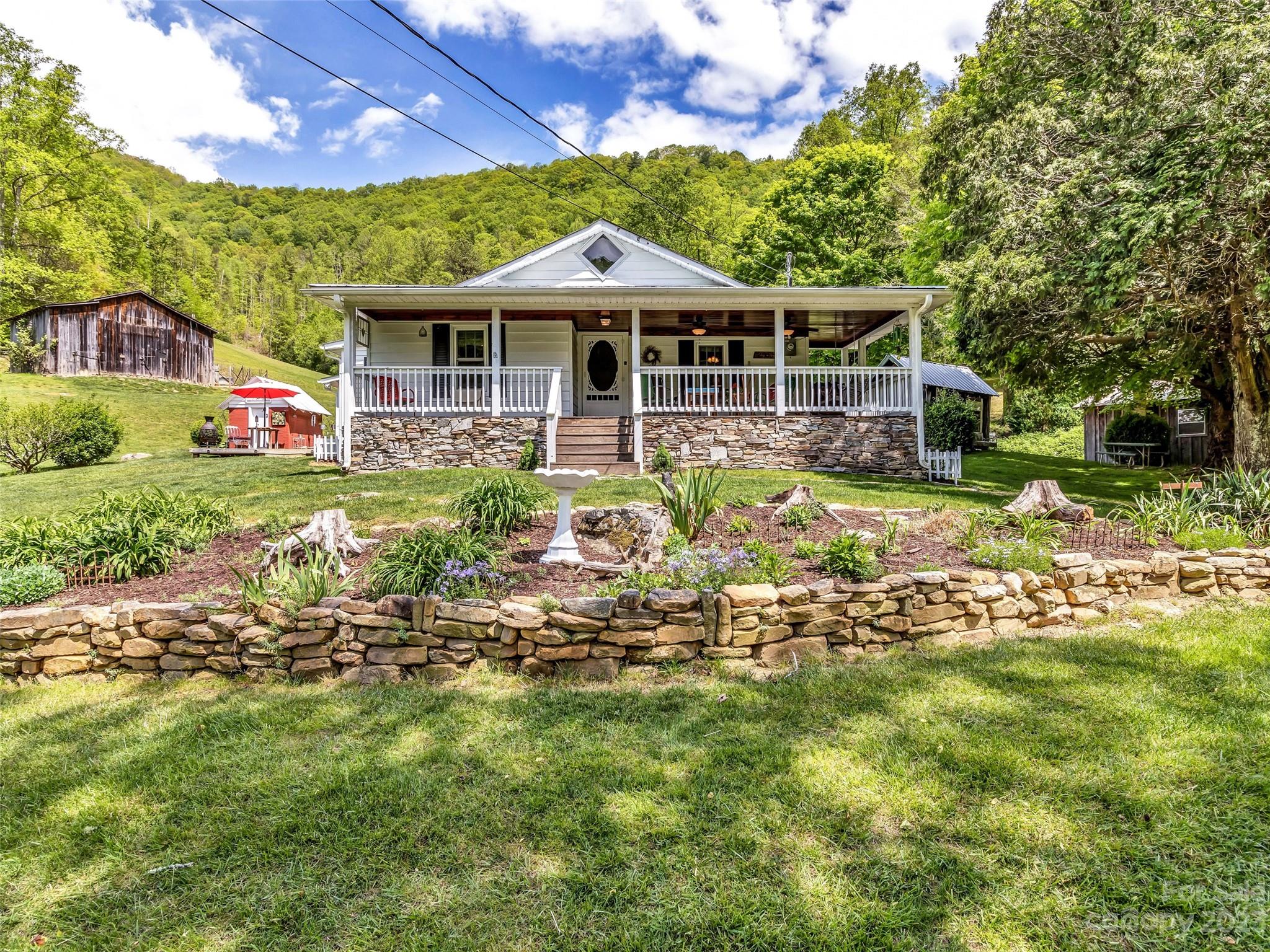 Photo 1 of 48 — 288 Flat Branch Road, Green Mountain, NC 28740