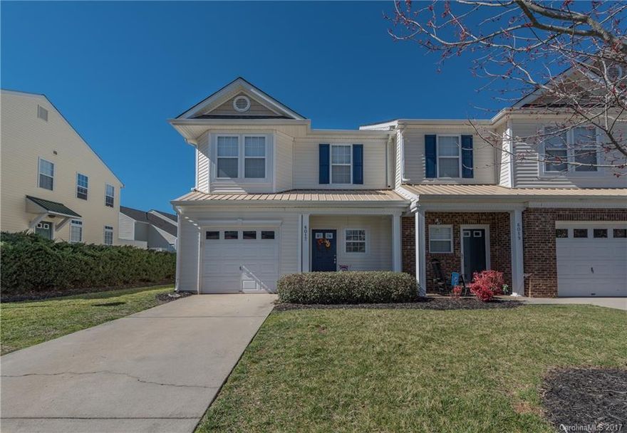 Gorgeous end unit townhome that is in excellent condition.  Kitchen features new granite and an upgraded fridge that is included.  Beautiful laminate flooring downstairs.   Dual master's each with a bath and walk-in closets.  Upstairs open area perfect for a study.  All this in a prime Indian Land location.