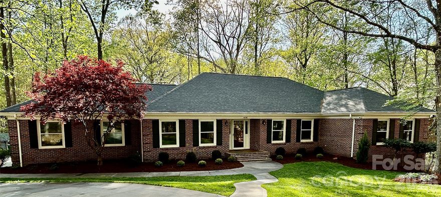 Tucked away on a quiet street in Providence Plantation, 9500 Hampton Oaks Lane offers a rare blend of timeless charm, thoughtful updates, and effortless main-level living. This beautifully maintained full-brick ranch—with a finished basement—sits on a private, tree-lined lot, where mature trees and quiet surroundings create a setting you’ll feel from the moment you pull in—welcomed by a circular drive and thoughtfully maintained landscaping.
Inside, the home unfolds with warmth and intention. Designed to live like a true ranch, the main level features the primary suite and most everyday living spaces. A flexible secondary bedroom and bath can be privately enclosed with a pocket door, offering an ideal setup for guests or a potential second en-suite.
Every inch of this home reflects careful stewardship and meaningful investment. Major upgrades—including two new HVAC units, updated ductwork, and a 50-gallon electric water heater—offer peace of mind. A whole-house water filtration system, updated septic components with dedicated pump circuit, and a newer roof further enhance the home’s turnkey appeal. With city sewer available, buyers also have the option to connect if desired.
The kitchen and living spaces flow seamlessly, enhanced by updated appliances including a double oven and refrigerator. French doors invite natural light, while a large picture window off the breakfast area overlooks the wooded backyard. Updated lighting, faucets, ceiling fans, toilets, and replaced windows— several with transferable warranties—add style and value. A built-in entertainment center anchors the living space, complemented by a robust electric fireplace.
The primary suite has been thoughtfully updated, featuring a beautiful bathroom with refreshed flooring and finishes, while additional bathrooms include granite countertops.
Downstairs, the finished basement offers incredible flexibility—ideal for entertaining, guests, a home gym, or media room—complete with a wood-burning stove that adds warmth and character.
Step outside and the lifestyle continues. The Trex deck (with transferable warranty) and enclosed Eze-Breeze three-season room create the perfect backdrop for relaxing or entertaining. A custom firepit, walkway, and added concrete pad extend the outdoor space, all enclosed by an aluminum fence.
Practical details shine—from the redesigned driveway and circular parking area to the EV/RV 50-amp plug in the garage—making this home as functional as it is beautiful.
Homes like this—meticulously maintained and thoughtfully updated in one of South Charlotte’s most beloved neighborhoods—don’t come along often.
9500 Hampton Oaks Lane isn’t just a home—it’s the kind of place you don’t just move into—you settle into.
