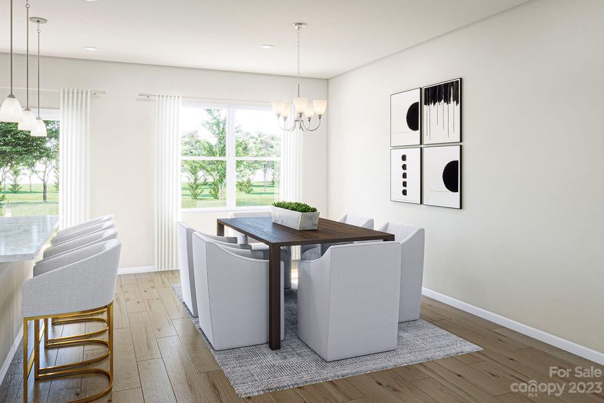 Beautiful New Home for Sale with the Classic III Design Package, an Upgraded Kitchen w/ 30" Electric Range and Convenience Package, 6' Sliding Glass Door in the Kitchen, Upgraded Primary Shower w/ Tile Walls, and Upgraded Secondary Bathroom w/ Tub Surround at a Competitive Price.

The kitchen presents a 30" electric cooktop, elevated stainless steel appliances, soft close umber cabinets and drawers, crisp white backsplash tile, all tied together by the stunning Caledonia granite countertops. The kitchen has a 6' sliding glass door connecting you to a 4' x 7' outdoor living space in the back.

Upstairs, there are two bedrooms, including the primary suite, featuring an upgraded shower with tile walls. Across from the primary suite is the upstairs laundry room, the secondary bedroom, and a secondary full bathroom which has been upgraded to feature a tub surround at the bath.