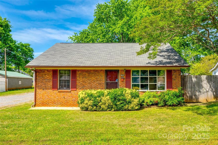 Welcome home to this adorable 2-bedroom, 1-bath brick ranch. Nestled in an established neighborhood, this home features spacious rooms throughout—including a generously sized living room and kitchen that's perfect for cooking and entertaining, and a large laundry room with plenty of extra storage space.  The bedrooms and bathroom are also spacious.  Recently updated carpets throughout.   Enjoy easy one-level living with a covered carport and a low-maintenance yard.  Great backyard! Whether you're a first-time homebuyer or looking to downsize, you'll appreciate the cozy charm and unbeatable location—just minutes from the shops, dining, and events of vibrant downtown Rock Hill. Don’t miss out on this lovely home!