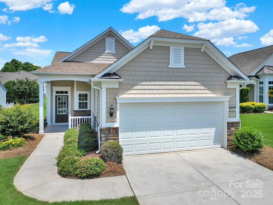 Welcome to this charming 2BR/2BA Fox Run plan in amenity-rich Sun City! Features include a formal dining room with wainscoting and a kitchen with Corian countertops, tile backsplash, island, pantry, and breakfast nook with adjacent laundry closet. The dining area flows into a spacious great room, perfect for entertaining. Guest bedroom and full bath are ideal for visitors, an office, or hobby space. The private primary suite offers a walk-in closet and en-suite bath with dual sinks and a glass shower. Enjoy the bright sunroom with two sliding glass doors leading to the patio—great for relaxing or hosting guests. Additional landscaping provides privacy, and there's extra space between homes on this quiet street. Come see this inviting home today!