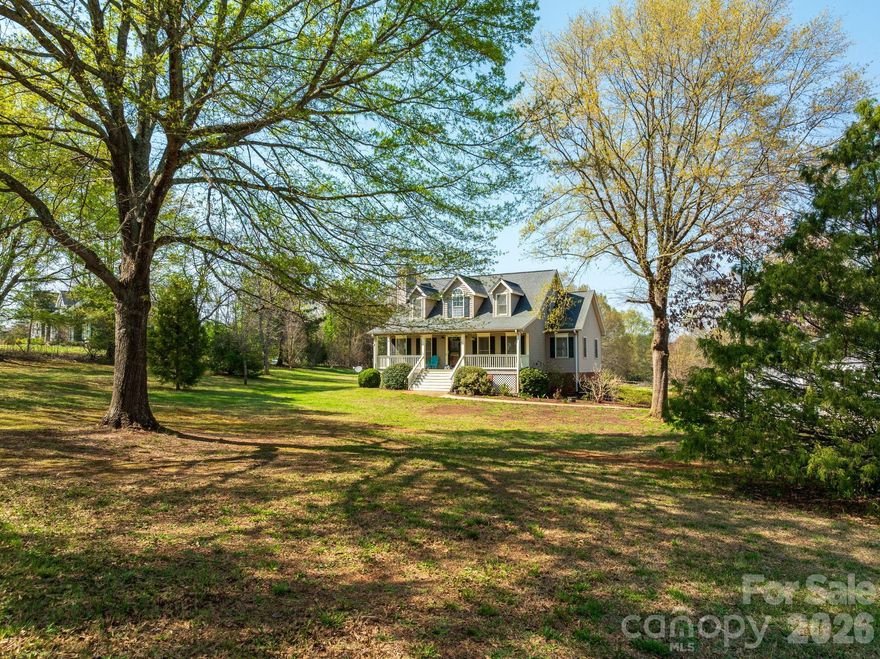 Set on 4.38 picturesque acres, this classic Cape Cod–style home offers a thoughtfully laid-out mini-farm with excellent equestrian potential. The land is well suited for horses, featuring a barn with four bays and dedicated hay storage, along with an electric fence that may remain in place or be removed to fit your setup. With open pasture space and room to customize, the property is ideal for a private horse retreat. The main residence offers 3 bedrooms and 2.5 baths, with new flooring in multiple rooms and comfortable living spaces designed to feel both practical and welcoming. A covered front porch, rear deck, and lower patio provide peaceful vantage points to enjoy the acreage and keep an eye on the barn and fields. A fully equipped basement apartment adds flexibility with a private 1BR/1BA, kitchen, and family room—perfect for guests, caretakers, or multigenerational living. A newly built 40x50 three-bay garage/workshop offers ample space for tack, equipment, trailers, or weekend projects. With usable acreage, existing horse infrastructure, and room to grow, this property offers a rare opportunity to create a personalized equestrian lifestyle anchored by a timeless Cape Cod home.