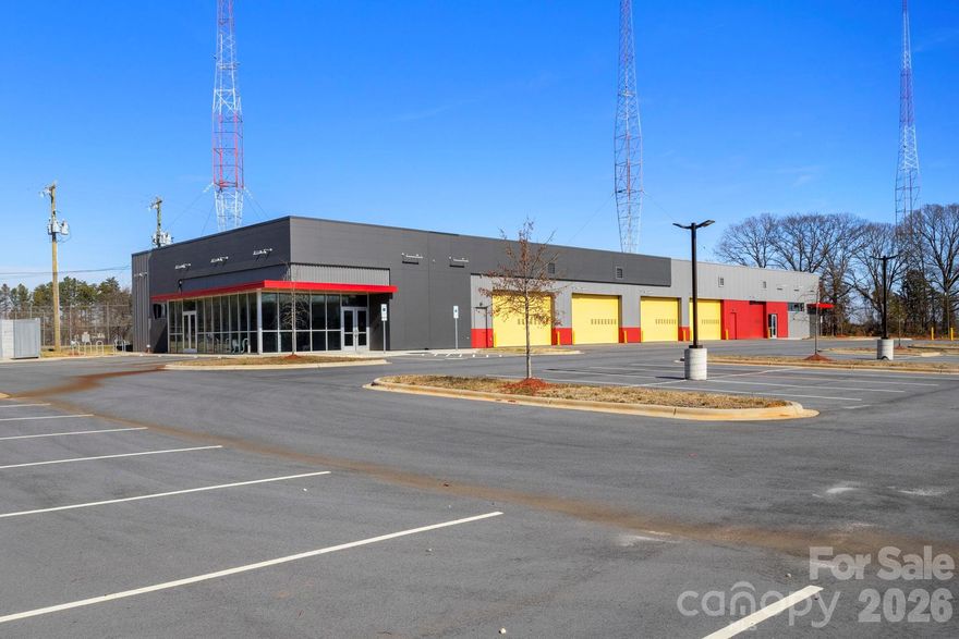This commercial property in Charlotte began construction in 2020 and was completed in 2024. Since then, it has never been used, offering a brand-new, modern, and innovative space. With 15,161 square feet of construction on 2.16 acres, it features abundant parking and an incredible location just minutes from downtown. This is a fantastic opportunity for anyone looking to launch or relocate their business in a cutting-edge environment!