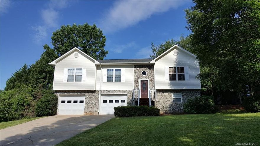 PERFECT family home for an affordable price! This split level 3BR/2BA home is located in Indian Springs. Features include new open concept floor plan, lots of windows for an abundance of natural light, open kitchen w/plenty of cabinets, island/bar, access to large rear deck & new roof. Master bedroom has full bath w/double vanities. The other 3 bedrooms share an additional full bath. Lower level has large family/rec room & a double garage. LOTS of SPACE for the MONEY! Don’t miss out on this one!