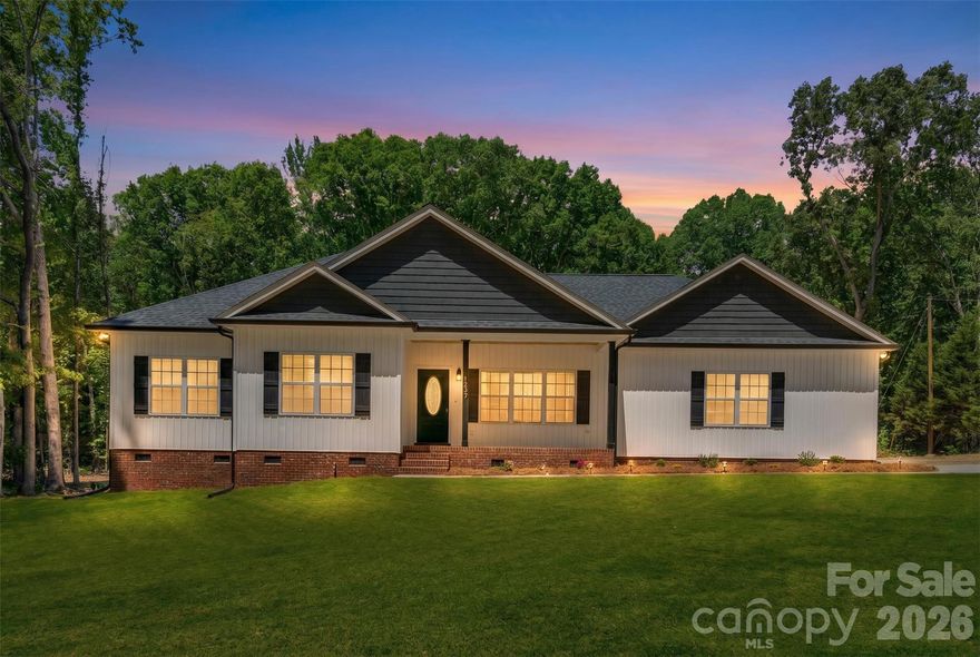 A Rare Find in Buford! Brand New Construction on 1 Acre.

Experience the perfect balance of modern luxury and country privacy. Situated in one of the area’s most popular school districts, this 3-bedroom, 2-bathroom new construction home sits on a gorgeous, cleared 1-acre lot.

The heart of the home is the open-concept kitchen and living area, bathed in natural light and accompanied by brand-new stainless steel appliances. Whether you're making breakfast or entertaining guests, this seamless layout keeps everyone connected. Retreat to the spacious bedrooms or head outside to the backyard—a blank canvas for your dream outdoor retreat. An attached garage provides excellent storage and parking. Enjoy ultimate peace and quiet without sacrificing convenience, located a mere 10 minutes from the vibrant local shopping and restaurant scene. Your dream home is ready!
(photos of grass have been edited)
