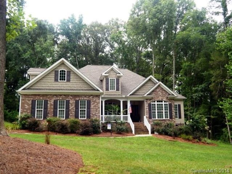 Immaculate custom built on with 4 BRs on main level which offers a spacious family room with beautiful coffered ceilings, frml DR, gourmet kitchen w/ breakfast area, stone FP, huge master BR with tray ceilings, dual sinks, jacuzzi tub and more! The upper level offer a BR, full bath and bonus room. Relax on the screened porch overlooking the private wooded lot. NO CITY TAXES!