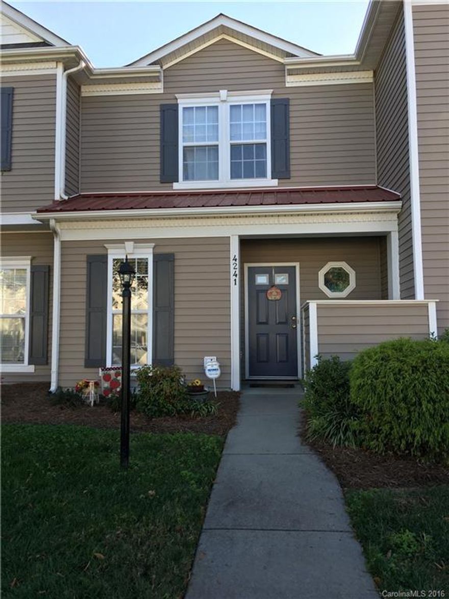 Enjoy a maintenance - free lifestyle!!  Walking distance to restaurants and shops.  Conveniently located near uncc,  Concord Mills, I85 and I485.  Move in ready -- water and sewer included in the hoa dues.