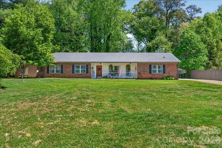 Reduced Price to put this one out front for you! Under $400k for this charming home in a fantastic location?!  Perfection!  This immaculate home is ready for you to move in right away, sitting on almost 3/4 of an acre of land, with a large front and back yard with peeks of views to Lake Norman out back this is a relaxing country lifestyle home with NO HOA and fatastic access to everything you need for shopping and food in Sherrills Ford and Denver, extremely easy and close access to Hwy150 into Mooresville and Linconton, close commutes to the local schools of Bandys High School, Mill Creek Middle and Sherrills Ford Elementary too! This full brick ranch was built with pride by the sellers and has been maitained with true pride of ownership and detail that shows throughout the property.