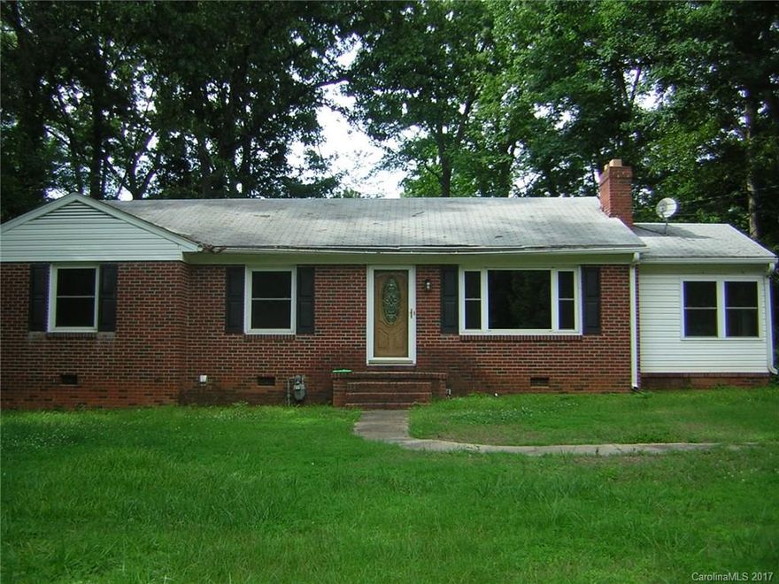 Nice home that needs some updates. Located in city and has wood floors and three bedrooms with a large lot. Perfect for first time home buyer or investment.