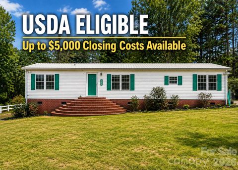 Photo of 205 W Haywood Lane, Mount Gilead, NC 27306 (MLS # 4328802)