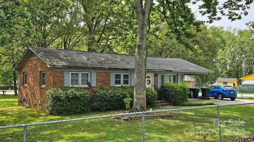 This is a mid century modern home, that can use updating. The home will be perfect for first time buyers entering the housing market that want to make the house their own by doing a renovation. The home is being sold  AS-IS since it needs updating and is priced accordingly.  The owner has a new roof scheduled to be installed by August 08, so this is an awesome deal. The new AC compressor was installed in 2018 as well.  The home also features a carport that has a storage area which currently houses the washer and dryer and there is a large storage shed in the backyard.  The last SHOWING will be Saturday July 20 at 5pm. Please make all offers Final and Best and the seller will make a decision Saturday Evening.