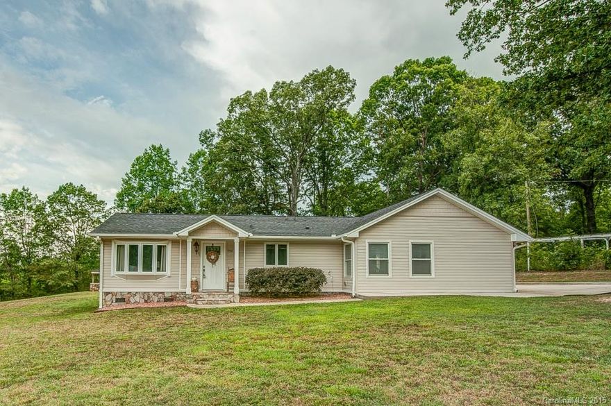 Beautiful Newly-Renovated Ranch style home on over an acre! Open floorplan offers an abundance of natural light. Beautiful hardwood floors flow throughout the home. Kitchen features granite counters, stainless steel appliances and cabinetry. Great room is large & has views directly into the Kitchen. Master Suite is privately located on the opposite side of the house away from secondary bedrooms. Secondary bedrooms are spacious. Large backyard with fire-pit and covered gravel area. Covered Patio.