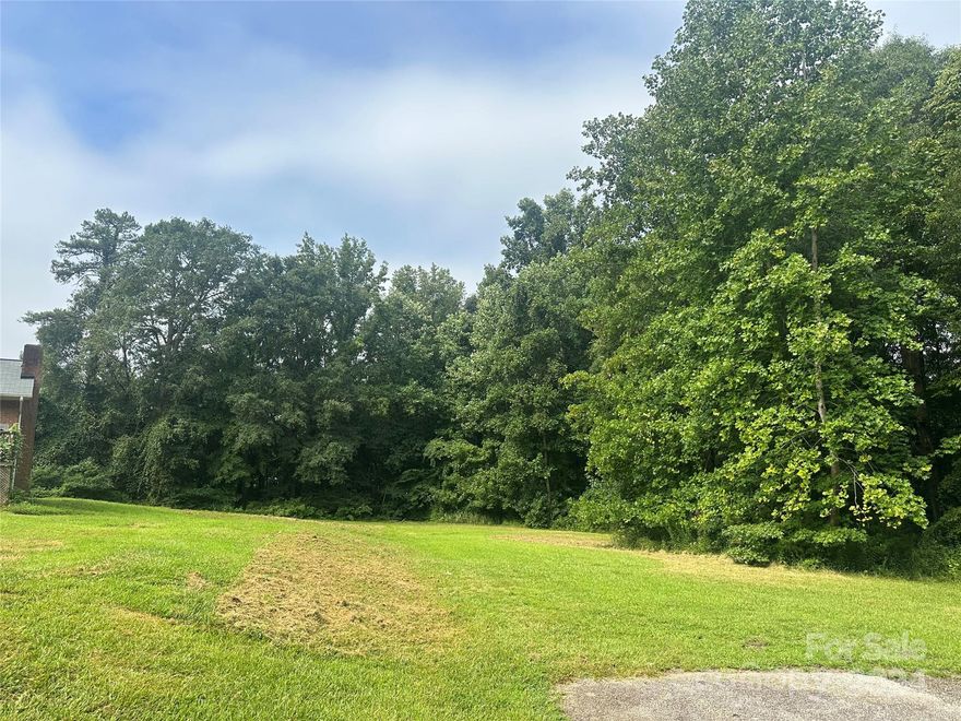 1.45 acres near Barberville Rd in Indian Land.   Convenient to Fort Mill and Ballantyne.   Owner believes there was a mobile home on the property years ago.  No septic permit on file. Water is available  Seller owns home to left of this property.  Septic permit not available for either property and septic and drain field location of 1124 Camp Cox is unknown