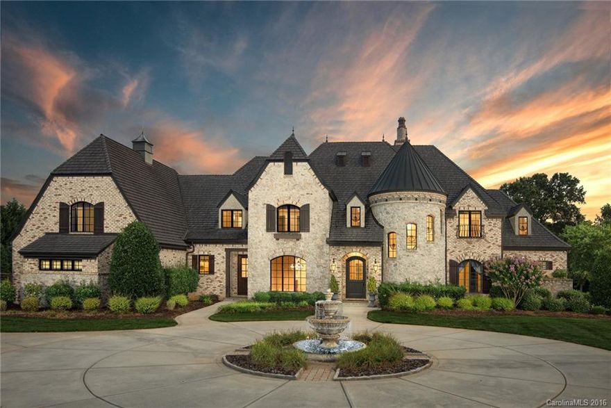 Stunning Custom Home with countless Upgrades.  This beautiful French Country Estate replica is quietly elegant, sitting on a 1 acre lot that backs up to a protected Conservancy property.  Gorgeous walnut hardwoods throughout the first floor.  The kitchen is a chef's dream: boasting a large island, custom cabinets, Sub-Zero Refrigerator & Wolf professional oven.  This luxury home offers a media room, game room, wine cellar, spa, pool, cabana & fountain. Surround Sound. Quartz epoxy garage floor.