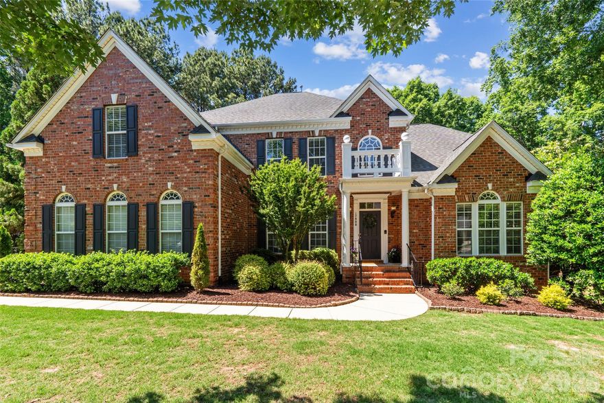 Nestled quietly at the end of a serene cul-de-sac, this magnificent, full-brick estate offers the ultimate sanctuary on a premium lot backed by a lush, private wooded tree save. From the moment you step inside, the spacious open layout sweeps you off your feet, seamlessly blending grand entertaining spaces with cozy everyday living. At the heart of the home, a true chefs kitchen featuring a premium gas cooktop stands ready for culinary adventures and lively gatherings that effortlessly spill out onto the expansive back deck, your own private oasis for stargazing or hosting summer barbecues against a peaceful, leafy backdrop with a soothing hot tub. After a long day, retreat to the main-level primary suite, a luxurious haven of tranquility designed for pure relaxation. Upstairs, a massive bonus room awaits, offering the perfect canvas for a home theater, game room, or creative studio, with generous sized secondary bedrooms, and one with an ensuite bathroom. The expansive three-car garage provides abundant space for vehicles and hobbies alike. Located in the highly sought-after, amenity-rich Palisades neighborhood, this home isn't just a place to live, it's a lifestyle of luxury, privacy, and endless comfort. Aug 23' new carpet, July 22' new tankless hot water heater, May 23' new HVAC downstairs, April 26' new paint whole house