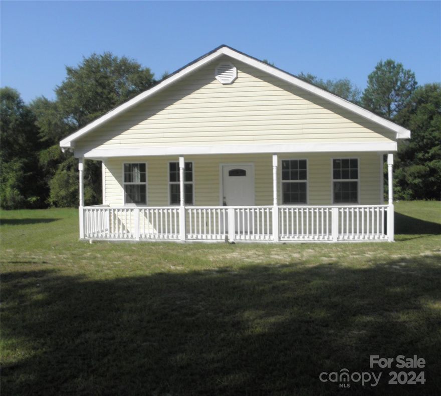 Welcome to 37 Davis Street, a charming newly constructed 2-bedroom, 2-bathroom home nestled on a .23 acre lot near historic downtown Cheraw.  This light and bright open floor plan is sure to please with a freshly painted interior and new flooring throughout.  The kitchen is open to the living area and includes an electric range and dishwasher,. Beautiful white kitchen cabinets complete this space. . No HOA fees. Don’t miss out on this charming home that combines the best of small-town living with modern comforts. . Schedule a private tour of this property today!