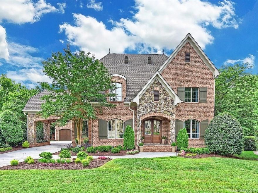 Incredible entertaining home that brings together luxury, elegance and high end details. This stunning, custom home has been completely updated and sits on one of the largest, flat lots in Stonecroft. Viking and Bosch appliances w/ open kitchen to family room graced w/ hand hewn beams. Covered porch w/ fireplace and new grill. Large terrace and patio. Bonus room + rec/media room, formals, 2 offices, 2 wet bars, 2 laundry rooms, garage workshop w/spiral staircase goes directly to 2nd FL rec room!