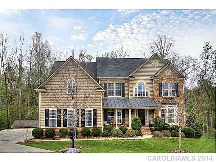 What a WOW house! The view from rear of this home is your own private sanctuary where deer roam & people play!  Home boasts fabulous & functional floor plan that is great for entertaining. Rocking chair front porch overlooks cul-de-sac.  Great flex space in basement (which is fully finished). Gourmet kit w/ dbl ovens & huge walk-in pantry. Sunroom off kit. Full yard irrigation PLUS extended irrigation in common are to extend the "use" and "quality" of yard behind house.  Extended driveway.