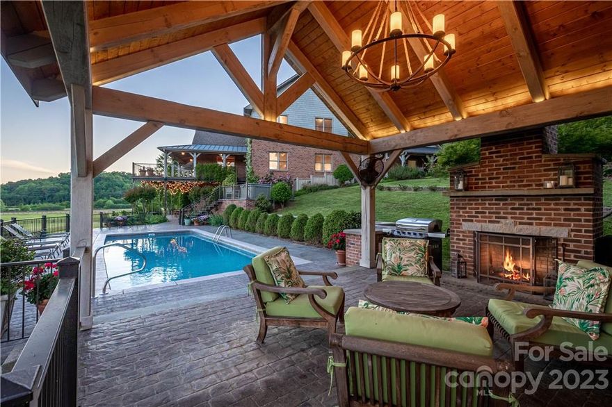 Welcome to your personal sanctuary for peace and privacy nestled in the foothills of Western North Carolina!  Property has 86 acres with approx. 1,500 feet of shoreline along the Catawba River. Canoe Creek along north end. The property will captivate and entertain you with walking, horseback riding, RV trails, and plenty of wildlife. Relax and enjoy the view from the wraparound porch or the pool area of this Timber Frame 5 bedroom, 4 full and two half bath home. Saltwater, fiberglass pool. Pool house has a shower, kitchenette and a kegerator. The 4 pastures and large riding ring provide a beautiful backdrop from the home and barn. The cedar barn has 6 interior stalls, 2 exterior stalls and 3 mini-horse stalls. The carriage house is perfect for storing your horse carts as well as golf carts! Maintenance/storage building. Conveniently located near downtown Morganton; One-hour drive to Tryon or to Charlotte Airport; 30 minutes to Linville Gorge.Also see MLS #4042377 for duplicate listing.