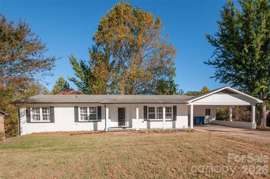 Spacious 4 bedroom, 3 bath home with finished basement with outside entrance.  Basement has 1 bedroom with walk in closet, full bath, shop area and spacious living area with fireplace.  Main floor has 3 bedrooms, 2 bathrooms with large Den with fireplace and a living room.  Open concept floor plan for Kitchen, Dining area and Den.  Basement entrance for Main floor located in the Den. Primary bedroom has primary bathroom with walk-in shower with shower seat built in.  
Basement would be ideal for a second living quarters.  
Great location near I77 and I40.  Nice quiet neighborhood nestled in established brick home neighborhoods,