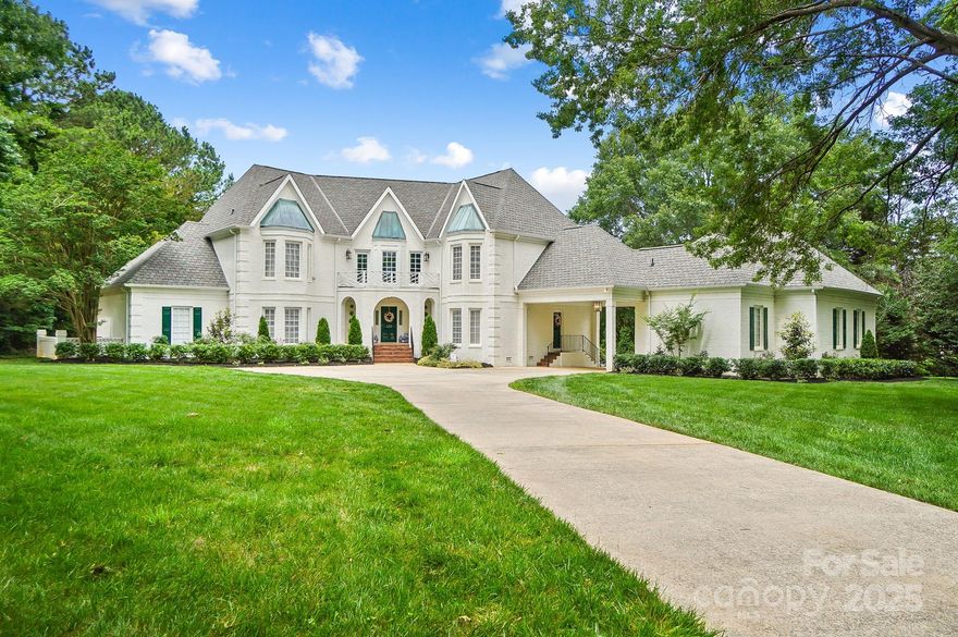 Welcome to your Southern sanctuary! Nestled on nearly 2.5 acres backing up to Longview Country Club, this expansive home blends timeless charm with vibrant personality. From bold accents to thoughtfully curated finishes, this home is anything but ordinary. Gorgeous new black & white marble entry greets you as you step into this beautiful home filled w/ natural light. The main level features new hardwood floors, enhanced lighting & a cozy and inviting office/library. The primary suite offers a peaceful retreat with an en suite bath, while 3 add'l bedrooms and 2 full baths upstairs provide plenty of space. A large bonus room w/ full bath connects by a charming porte-cochere, ideal for a guest suite, studio or office. Outside a massive deck overlooks your own backyard oasis complete with a pool & fire pit perfect for summer gatherings.  New roof (2023)w/copper accents and upgraded gutters,all new entry doors and exterior lighting. Come see what makes this home truly unforgettable!