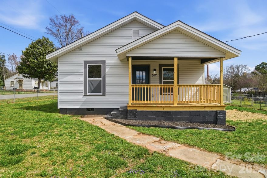 USDA Eligible so no down payment! Experience this beautifully renovated modern home, designed for comfort and style. This 2-bedroom, 2-bathroom gem features an open floor plan with gleaming LVP flooring and sophisticated finishes throughout. The kitchen is a highlight, with soft-close cabinetry, granite countertops, and stainless steel appliances. The modern bathrooms offer one with a relaxing tub and another with a sleek shower, both with quartz countertops. Plus, a convenient new laundry room adds even more functionality. New roof, electric, plumbing, HVAC. All permits pulled and inspections passed for peace of mind. Both front and backyard are fully fenced, creating a private oasis - perfect for pets! Don’t miss this perfect blend of contemporary design, thoughtful details, and added convenience! Only 3 minutes from downtown Stanley and 30 minutes from Charlotte.