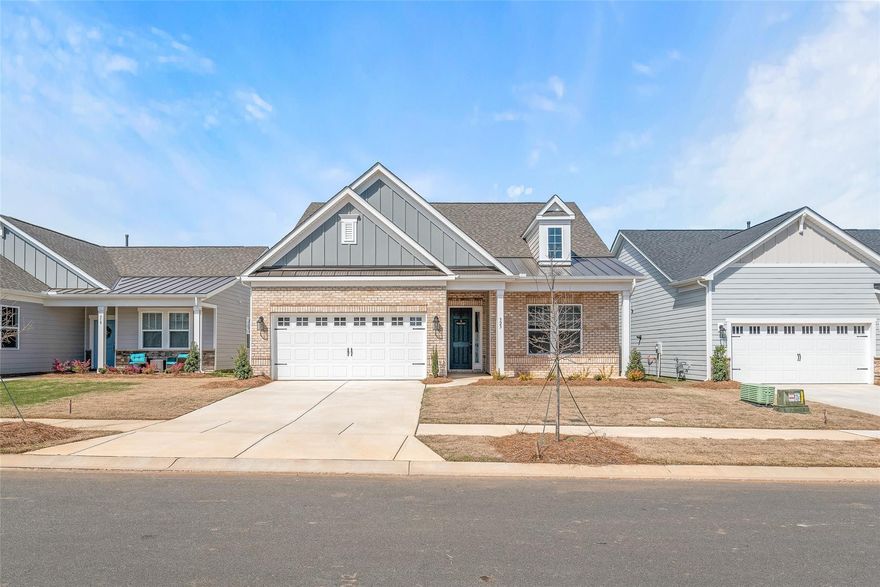 Breathtaking home in amazing 55+ ACTIVE community with resort campus! BRAND NEW already equipped with upgrades like wood blinds, laminate wood flooring and so much more! Welcome to the highly-sought after Pembrooke 1.5 story floor plan featuring inviting foyer, lovely, open gourmet kitchen with Quartz counters, tile backsplash,gas cooktop and wall oven, spacious great room with fireplace, primary bedroom with private ensuite and 2nd bedroom and bath (all Quartz counters & designer tile) on the main level as well as drop zone & laundry room.  Upstairs you will find a full bath, a bedroom and multi-purpose bonus room. Relax and enjoy the covered porch (easily screened-in). Plus attached two-car garage.  Play pickleball, attend activities planned by full-time social director, gather around the pool, spa or fireplace. Amenties include dog park, fitness center, REC area, pool, walking trails, and picnic area. Near great restaurants, shopping & medical facilities.