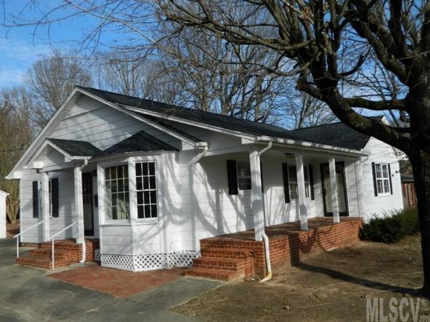 Updated 2 bedroom 2 full bath ranch with full basement and detached 2 car garage. Interior features new SS appliances, new wood flooring through out, replacement windows, upgraded wiring, fresh paint and a walk up attic that could be used for storage or as additional living space. Exterior features an architectural roof, greenhouse, wired storage building, fenced back yard, and area for a garden. Nice corner lot!