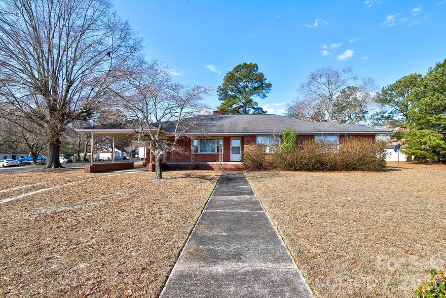 Perfect opportunity for an investor or anyone looking to make this home their own.  On a spacious half acre, corner lot in the town of Pageland, SC- this home has four bedrooms, two bathrooms, attached carport, and tons of space.  Cosmetic updates will make this home SHINE!!!