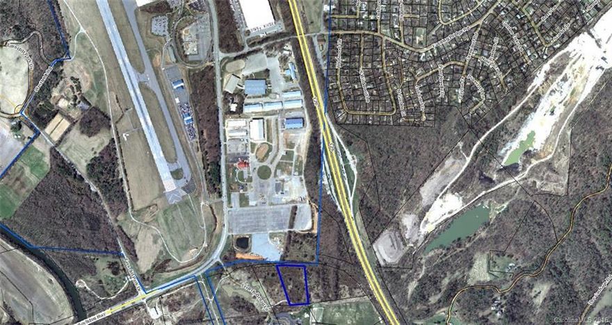 Property is one of 2 Parcels available, 14 acres total. Unique opportunity to develop property located next to Broadmoor Golf Course and Western Carolina Agricultural Center. Directly across from Asheville Regional airport.