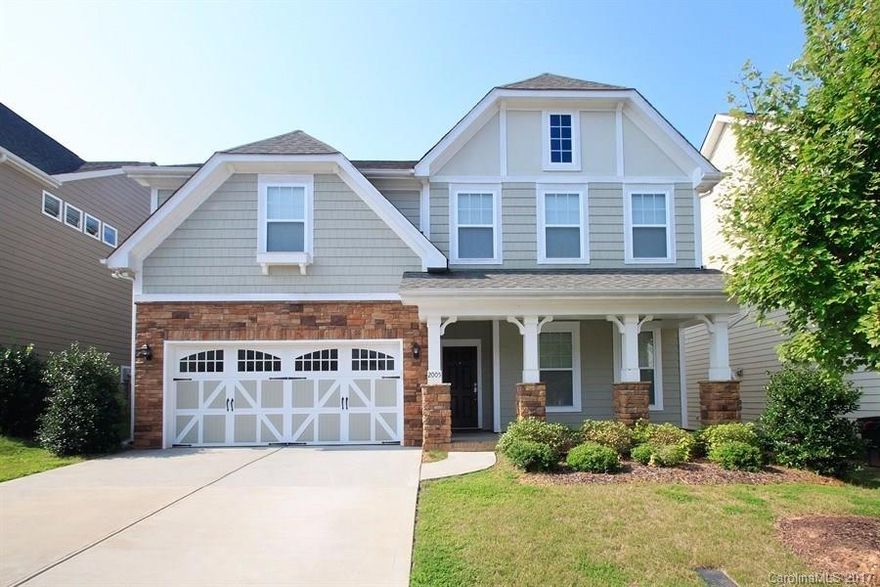 Beautiful 5 bed/3.5 bath home just inside the lovely Millbridge community. Natural hardwoods and some carpet on main. Island kitchen has black quartz counters, stainless/black appliances, 42" cabinets, a stamped metal back-splash and a large walk-in pantry. Master bath has a garden tub, separate shower and raised dual vanities. Covered porch in front and a large, flat back yard with a patio. Equipped with Smart Lock and thermostat option for key-less entry and reduced electric bills.