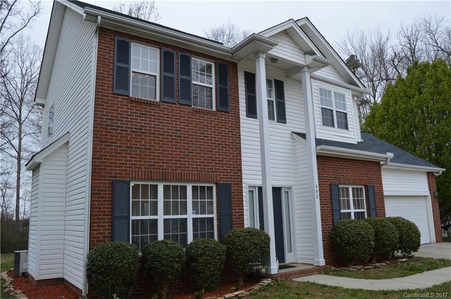 Welcome Home!  Adorable 2 story home in cul-de-sac lot.  Covered Patio is perfect for entertaining.  Large private rear yard.  Open eat in kitchen.  Formal dining room.  Cozy gas fireplace with granite surround in family room.  Two car attached garage.  Master suite features trey ceiling.  Master bath has separate shower and garden tub.  Neutral colors.  Ready to move in.  Don't miss this wonderful opportunity.