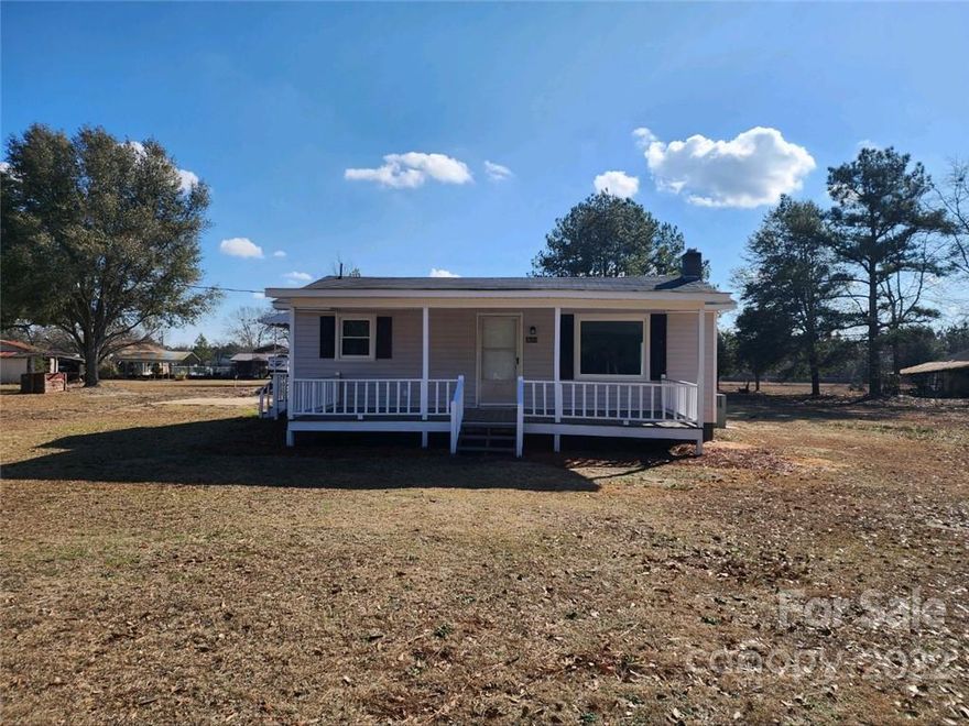 There is no wasted space in this adorable bungalow, that was recently updated.  It features new floor covering, fresh paint, new heat pump and more! The kitchen features granite counters and new cabinets. The open floor plan makes for a spacious living/dining and kitchen area.  The two bedrooms share easy access to the full hall bathroom with updated vanity. There is an oversized rear laundry room.  Enjoy the shade of the front covered porch.