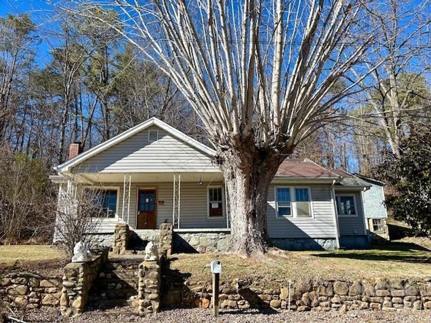 One story bungalow built in 1940 on .73 acre lot in the Bethel area of Canton.  Year round mountain views. Detached 2 story outbuilding and storage shed. Home features kitchen with wood stove, dining room, living room, 2 bedrooms, 1 bathroom with stone floor and shower wall, utility room with electric water heater and a bonus room. Propane furnace. Covered front porch. Conveniently located to Frank's Grocery/Gas Station and Jukebox Junction Restaurant.