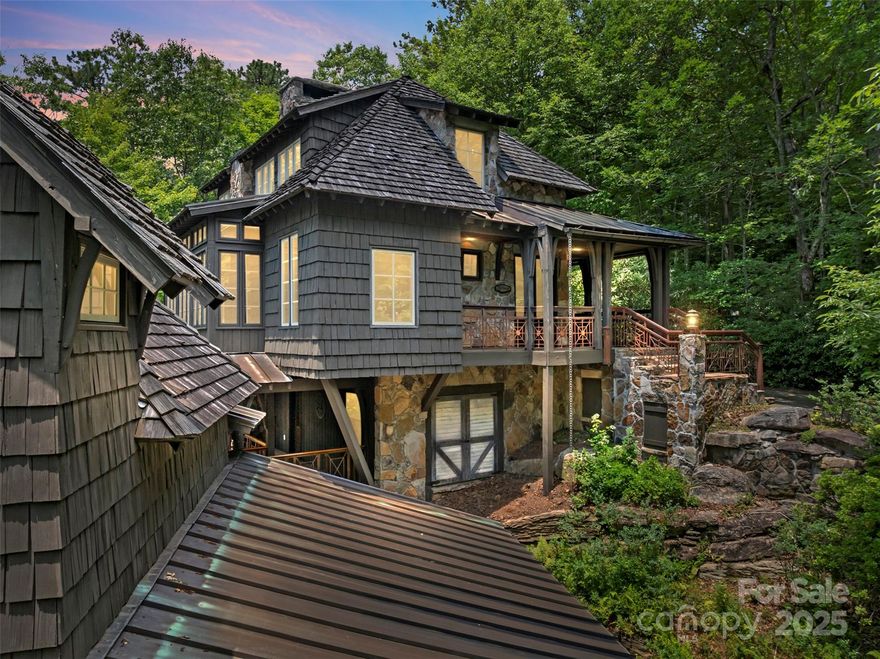 Welcome to Idyll Cottage, a European-style chalet in the gated Cliff Ridge community at Caesars Head. The neighborhood is positioned along US 276 between Greenville and Brevard. This custom mountain retreat offers 2622 sq ft of rustic elegance on a lush .71-acre lot. The main home features 3 bedrooms and 3 baths, plus a separate 1-bedroom guest apartment with its own entrance. Crafted with natural materials like Tennessee fieldstone, wood, copper, and cobblestones, the home features exposed beams, hickory floors, three stone fireplaces, and antique Victorian steel porch railings. Highlights include vaulted ceilings, a dedicated office, high-speed internet, and separate upper/lower entrances. Outside, enjoy two cobblestone driveways, a carport with storage, natural gardens, and a lifetime shake roof with copper accents. Community amenities include two pools, clubhouse, gym/game room, tennis courts, stocked lake, and golf cart-friendly roads. Offered turn-key with negotiable furnishings.