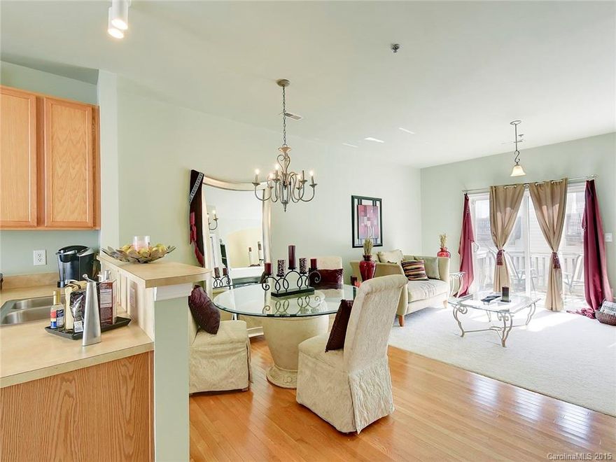 Wonderfully well maintained 2 bed 2.5 bath condo. Conveniently located between Northlake Mall and Shoppes at the University. Great access to interstates 85, 485 & 77. Entertain guests in living room equipped with gas log fireplace and open to kitchen or simply relax on the elevated wood deck or back patio. Front door is just a few steps away from community pool when you are ready to cool off. Come take a look today!