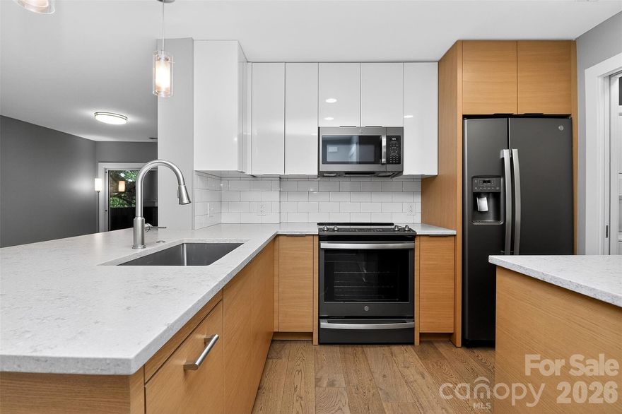 If you've dreamed of Myers Park luxury without the typical Myers Park price tag, welcome home! 603 Queens Rd. #B was remodeled to the studs and wires in 2021 with thoughtful design to include a separate pantry and laundry and ample storage, gorgeous fixtures including beautiful distressed MSI quartz, huge mid-century modern custom cabinetry and storage, custom California Closets fixtures in both bedrooms and two storage closets, and beautiful floor-to-ceiling tile in both showers. Step out of the home to walk or bike to Freedom Park or some local favorites such as Mama Ricotta's or Ruru's Tacos-- the location within the wide streets and tall trees of Myers Park is unimpeachable.