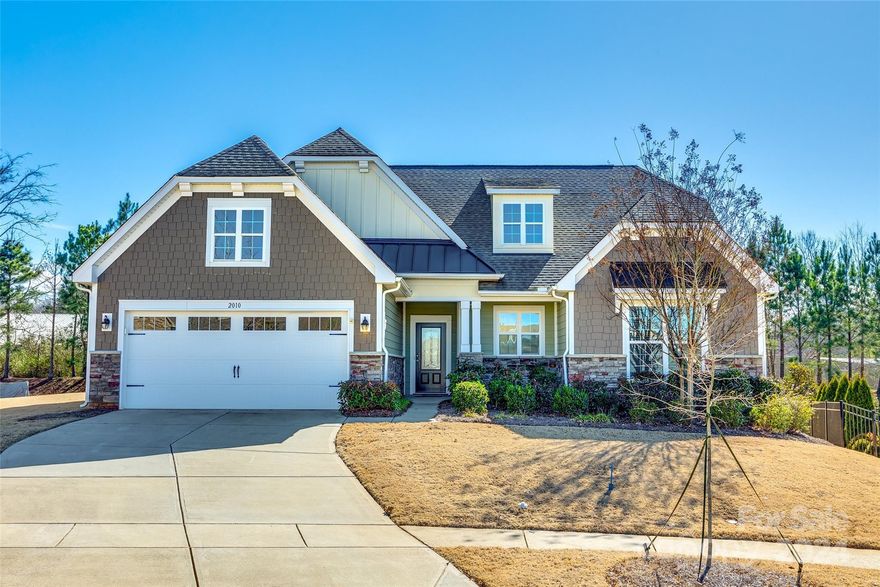 One-story living in desirable Summerhouse at Paddlers Cove! Situated on a cul-de-sac lot, this home offers beautiful curb appeal & is just as stunning on the interior! Open, split-bedroom floorplan & no wasted space, with multiple large storage closets. Gourmet kitchen, open to living & dining, features a massive island, extensive cabinet & counter space, SS appliances (refrigerator conveys!), gas cooktop & a large walk-in pantry. Living room with gas log FP (mounted TV conveys!) Laundry room with utility sink (washer & dryer convey!) Bedrooms all with large walk-in closets & clean carpets. 2-car garage with epoxy flooring.  Screened in patio out back! Vinyl plank flooring throughout living, tile in baths & laundry. This home is in immaculate condition, a clean slate, nothing has ever been hung on the walls! Prime location, Clover Schools & convenient to so many amenities + Paddlers Cove's Field Day Park!