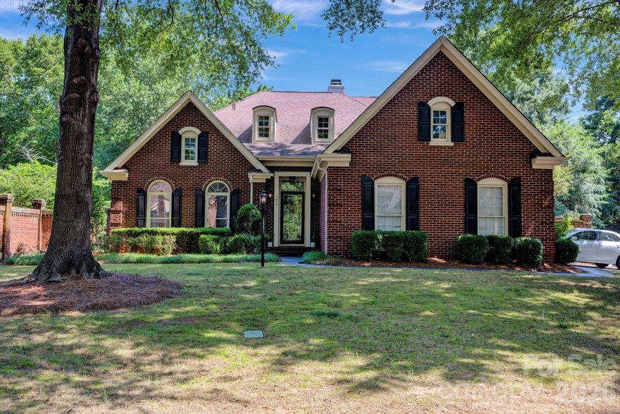 This beautiful, Brick, 4-Bedroom home with the Primary on the Main, resides on a cul-de-sac within PullenGreen's gated community! As you enter this light-filled home, with its soaring 2-story entrance, notice the brand NEW LVP flooring that is a highlighting backdrop for most of the main level! Neutral paint tones and smooth ceilings (no popcorn) run throughout as well. The updated Kitchen offers quartz countertops, a sizable island and SS appliances - Refrigerator conveys. And...imagine breakfast while gazing out at your shimmering and refreshing in-ground pool! It's just steps away to your outdoor living area which is private and has a covered patio - so host that BBQ and Pool outing with family and friends! Or, simply relax with a good book and cool beverage! As you move on to explore the upstairs, you'll notice NEW plush carpeting provides a refreshing look to the staircase, 3 additional Bedrooms and versatile Loft! The modern Full Bath will impress guests as well! HVAC 2022 & Zoning added 2024. Tankless Water Heater. Walk-in Attic provides 225 sq. ft. of storage! Side entry garage allows front of home to be seen by all! Great shopping and dining are nearby in Waverly, Blakeney and Ballantyne! Investors - please review rental restrictions; there is a cap.